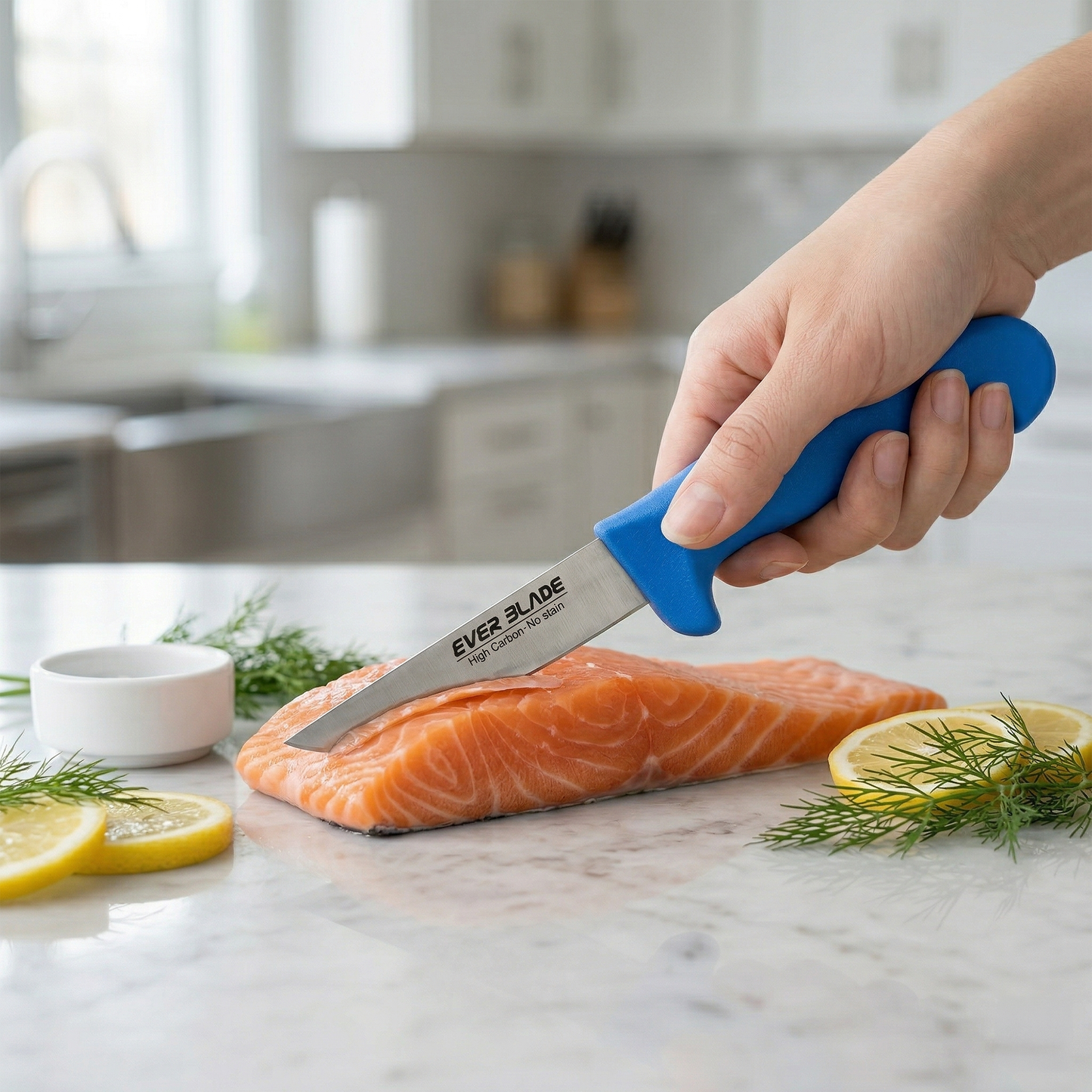 Person using a blue-handled knife to cut a piece of salmon on a kitchen counter.
