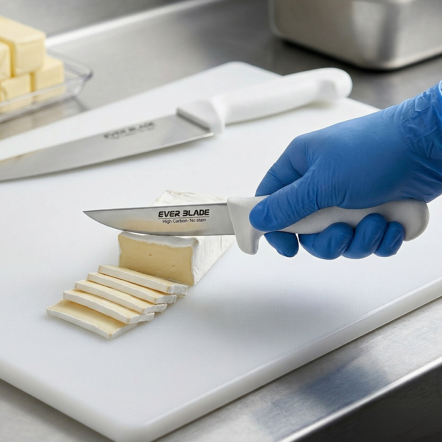 Person cutting cheese with a knife labeled 'Ever Blade' on a cutting board.
