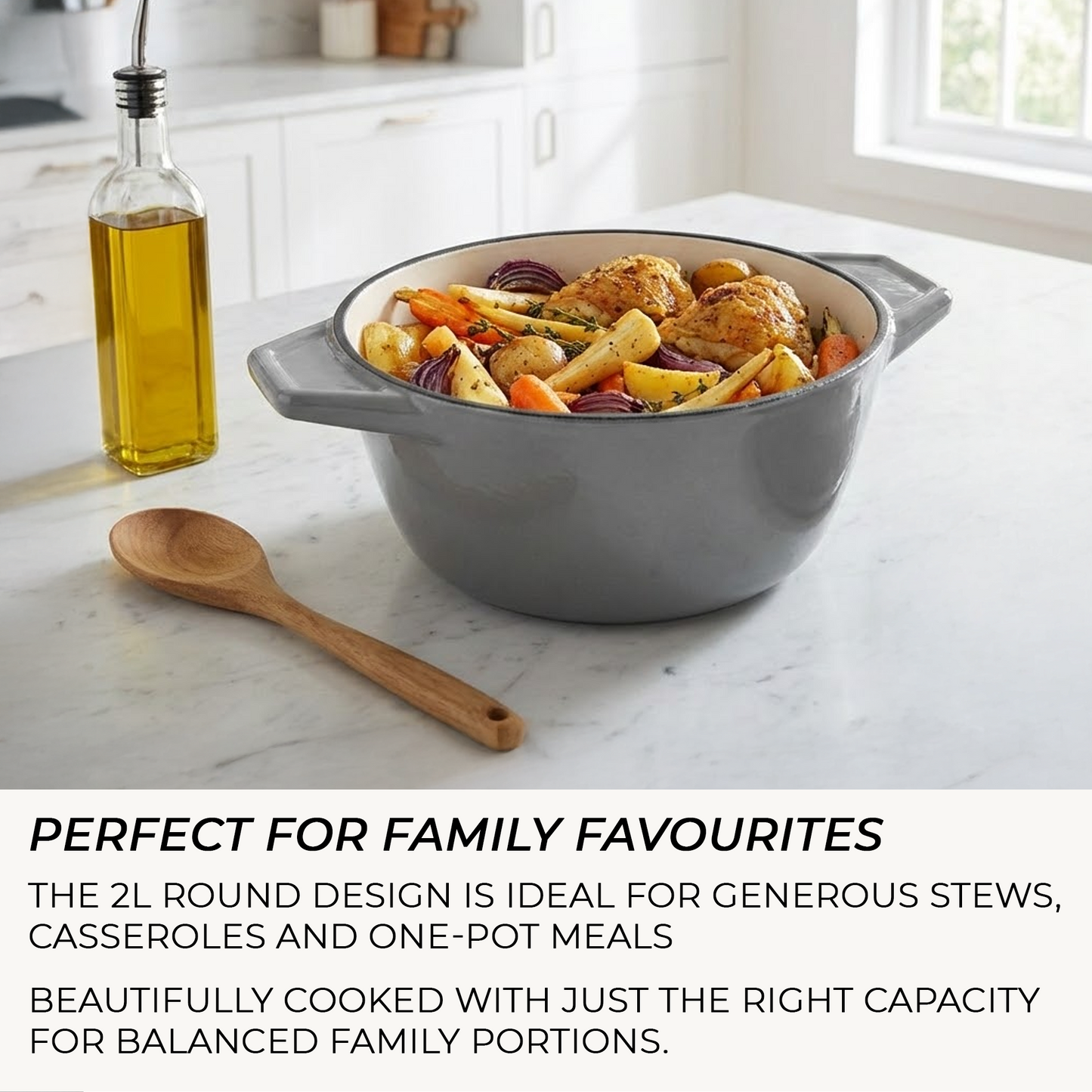Gray casserole dish with roasted vegetables on a marble countertop, with text about its use for family meals.