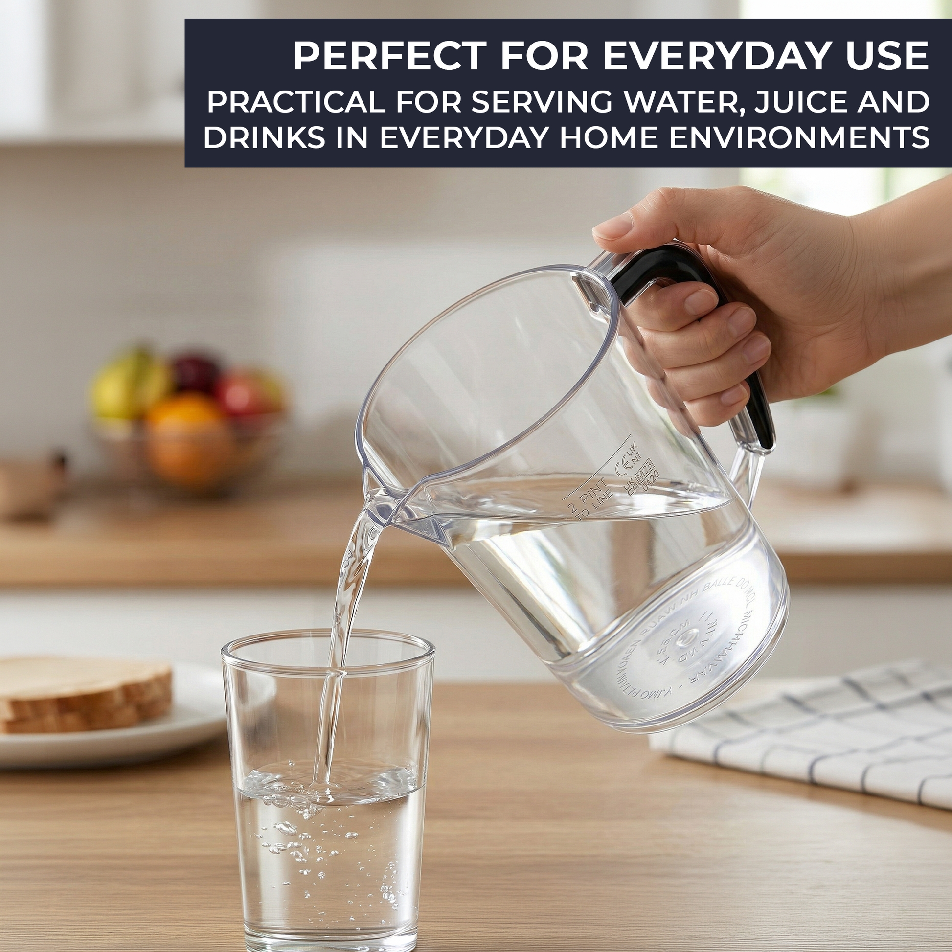 2 pint plastic jug with easy pour spout and ergonomic handle pouring