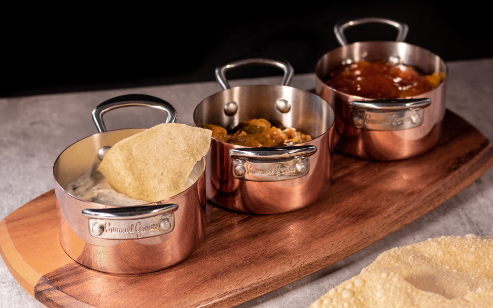 3-piece 9cm copper casserole set with wooden tray.