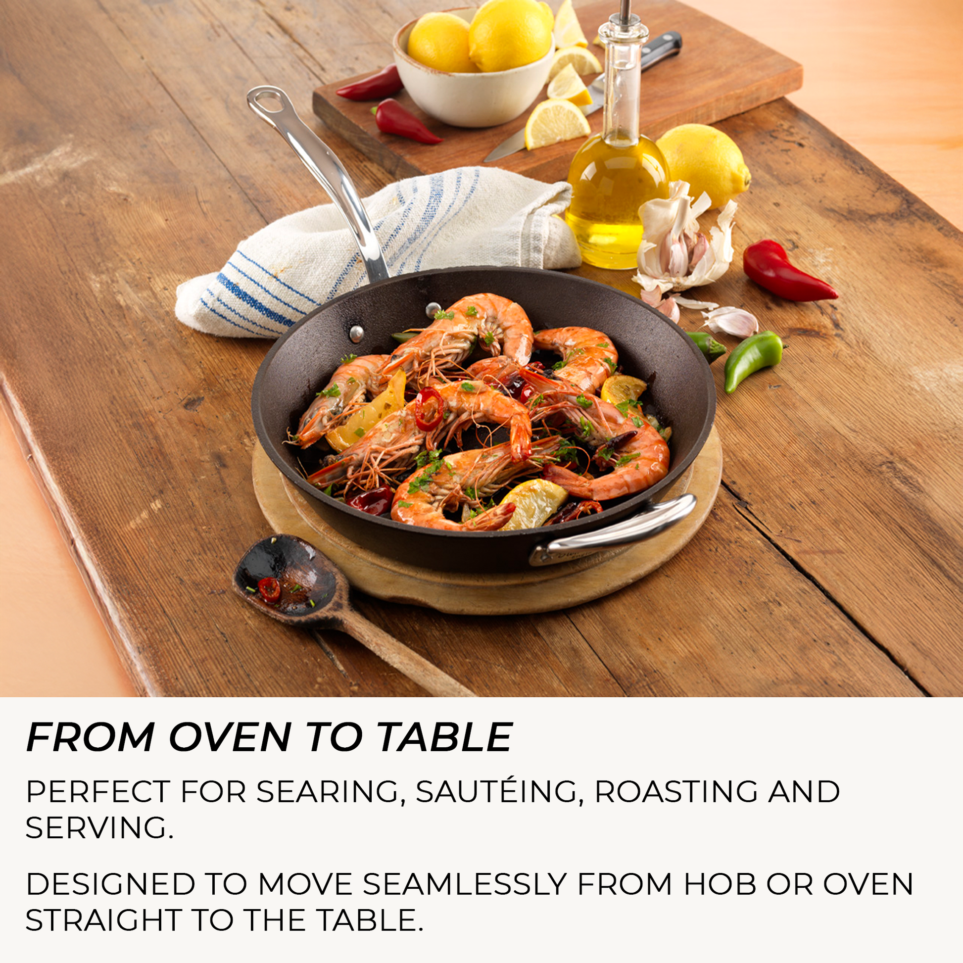 Britannia 20cm cast iron frying pan held in hand showing compact size