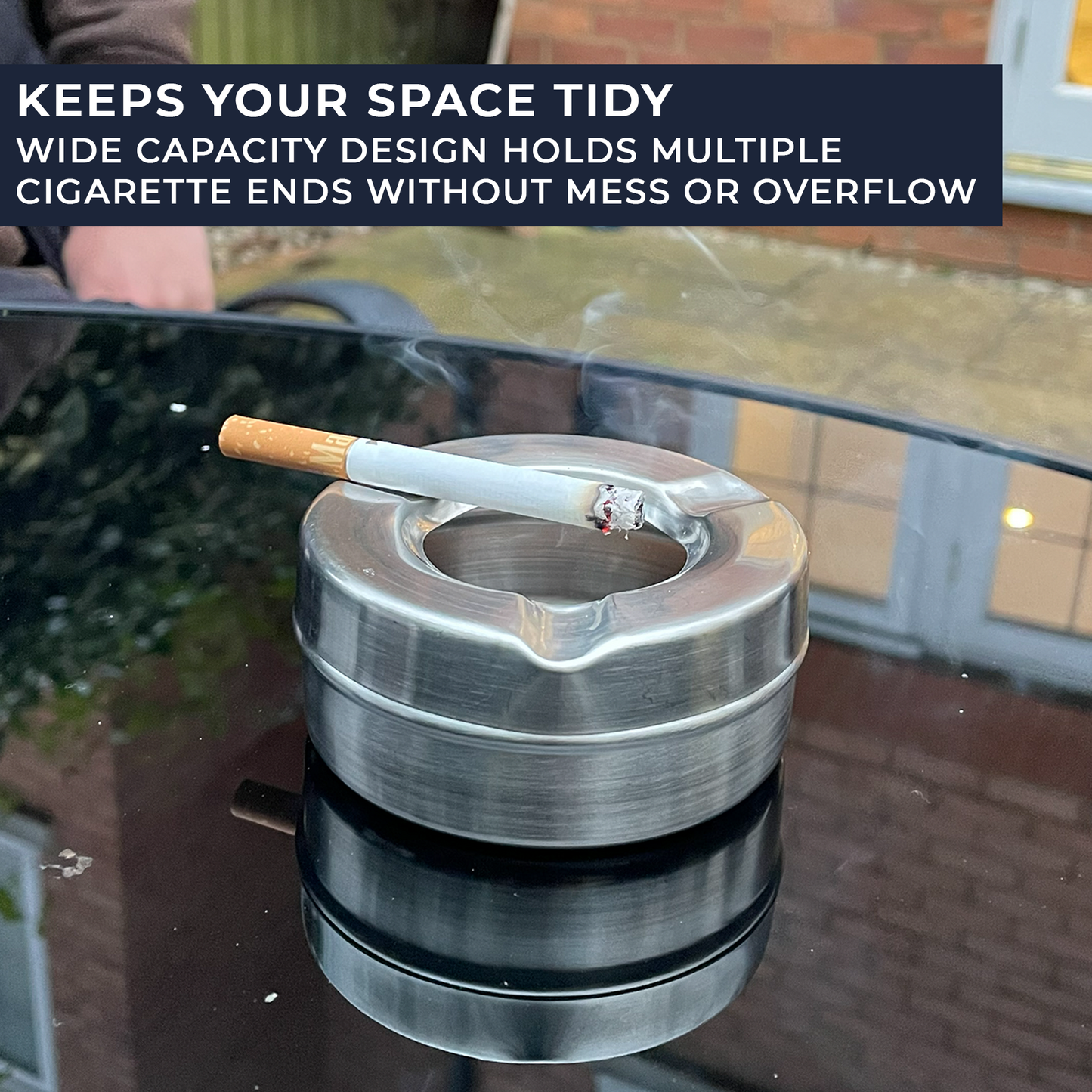stainless steel ashtray in hand size reference
