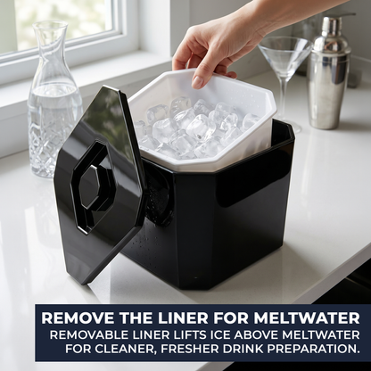 Black ice cube tray with removable liner on a kitchen counter.