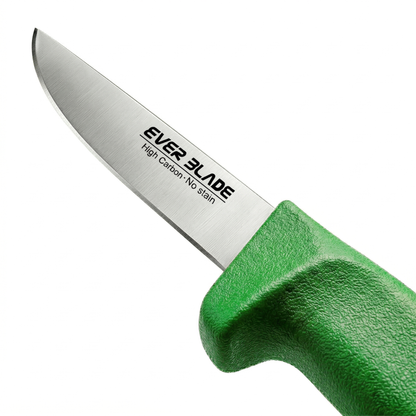Paring knife cutting vegetables on kitchen chopping board

