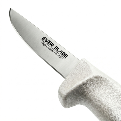 Paring knife slicing cheese on kitchen chopping board
