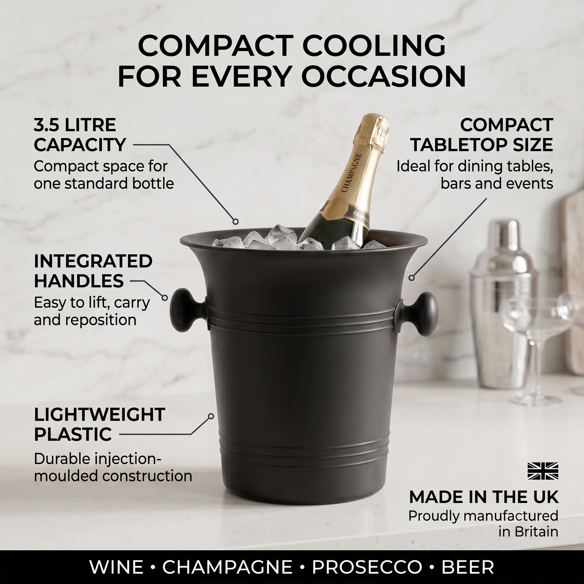 A black compact wine and champagne ice bucket with integrated handles, shown on a white marble surface with a bottle in it. The image includes text callouts highlighting features like 3.
