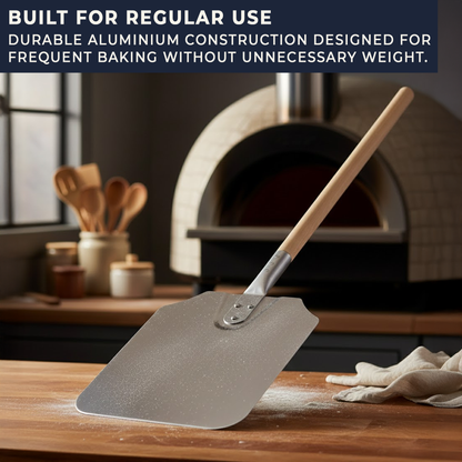 Durable aluminium pizza paddle resting on worktop showing quality construction