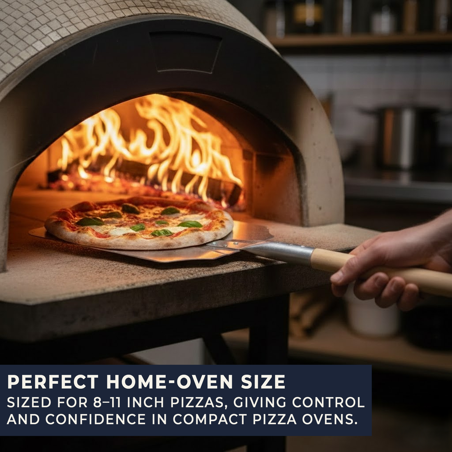 Long handle aluminium pizza peel used safely near high heat in pizza oven