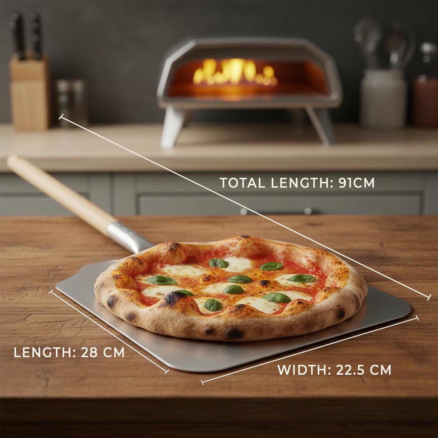 Pizza peel with 10 inch pizza showing 28 x 22.5 cm blade size and 91 cm overall length