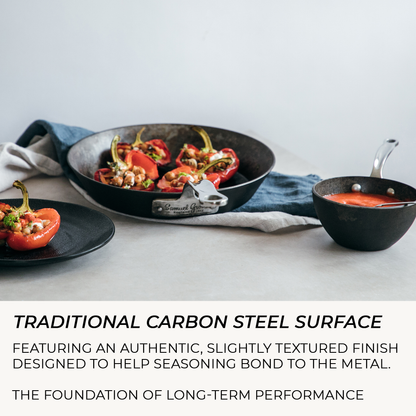 Seasoned carbon steel frying pan showing traditional slightly textured cooking surface