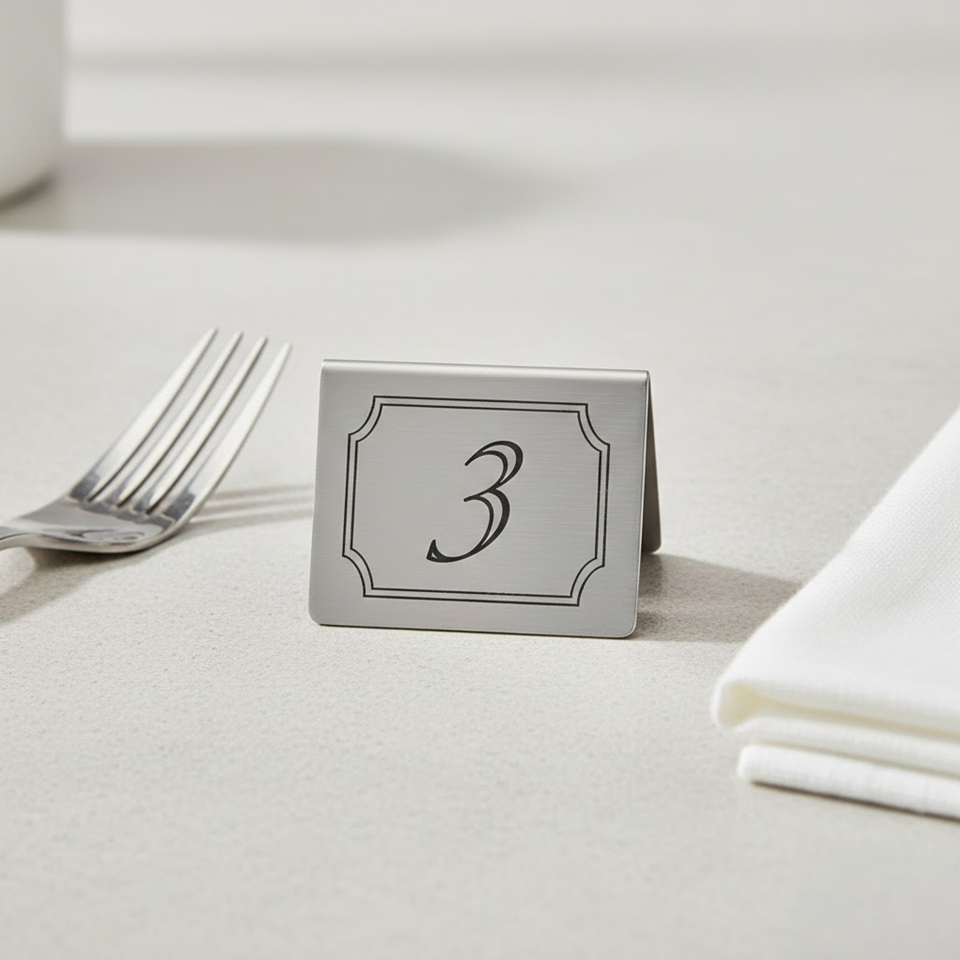 Heavy duty stainless steel table number showing solid metal construction